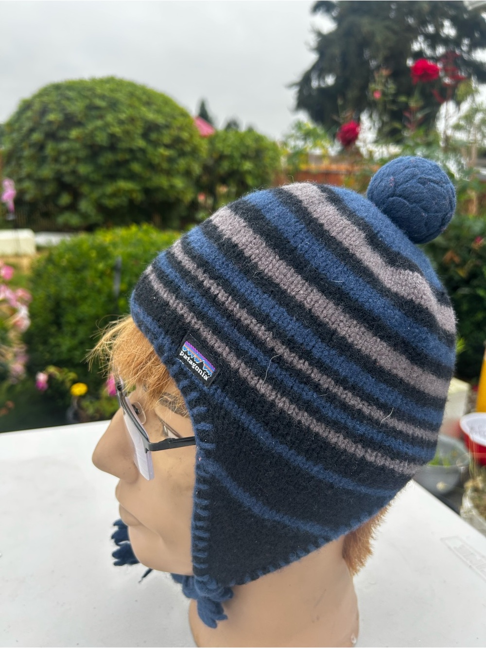 Patagonia Women’s 100% Wool Earflap Beanie in striped Navy and Gray knitting Hat